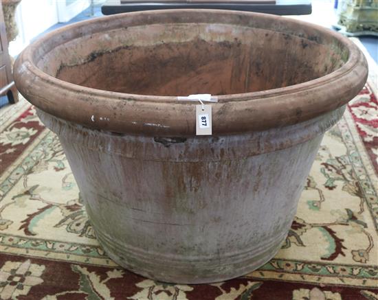 A large terracotta pot, W.110cm